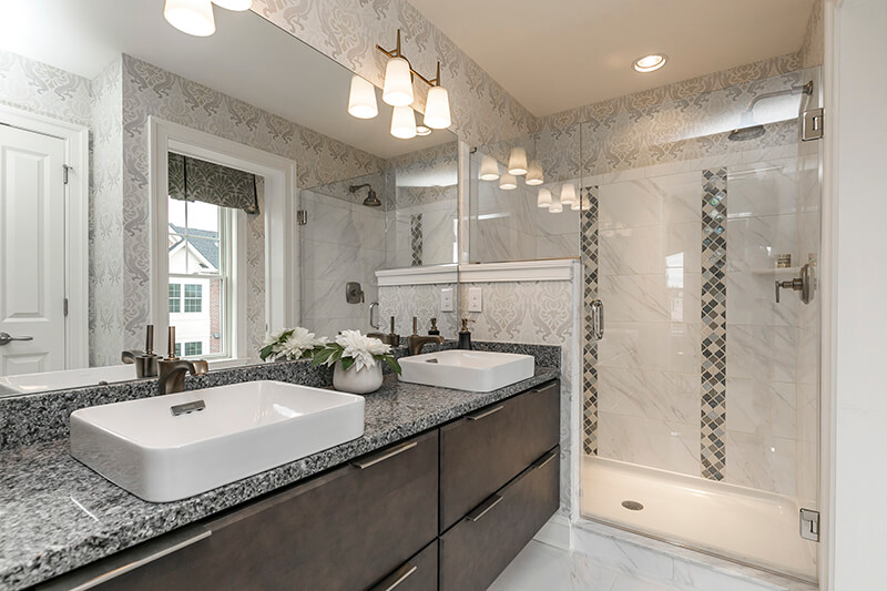 Relax and unwind in your owner’s bathroom retreat.