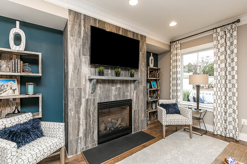 The great room provides a space for watching TV or cozying up by the fireplace!